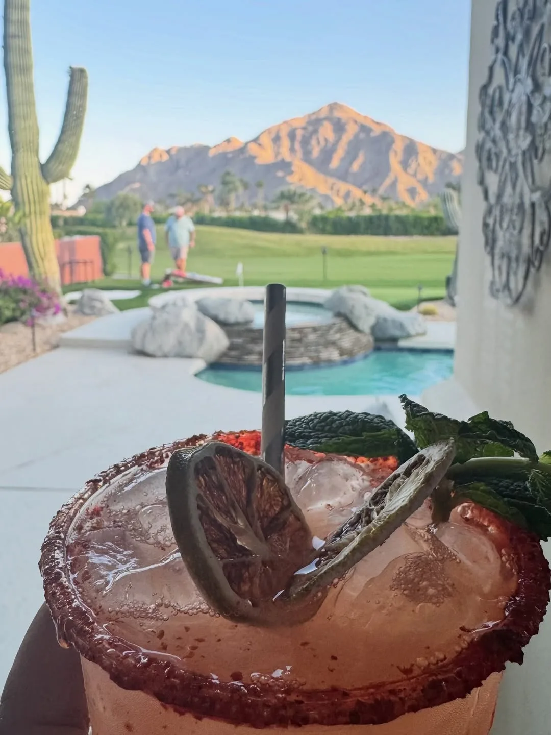 Signature cocktail with a Coachella Valley mountain view